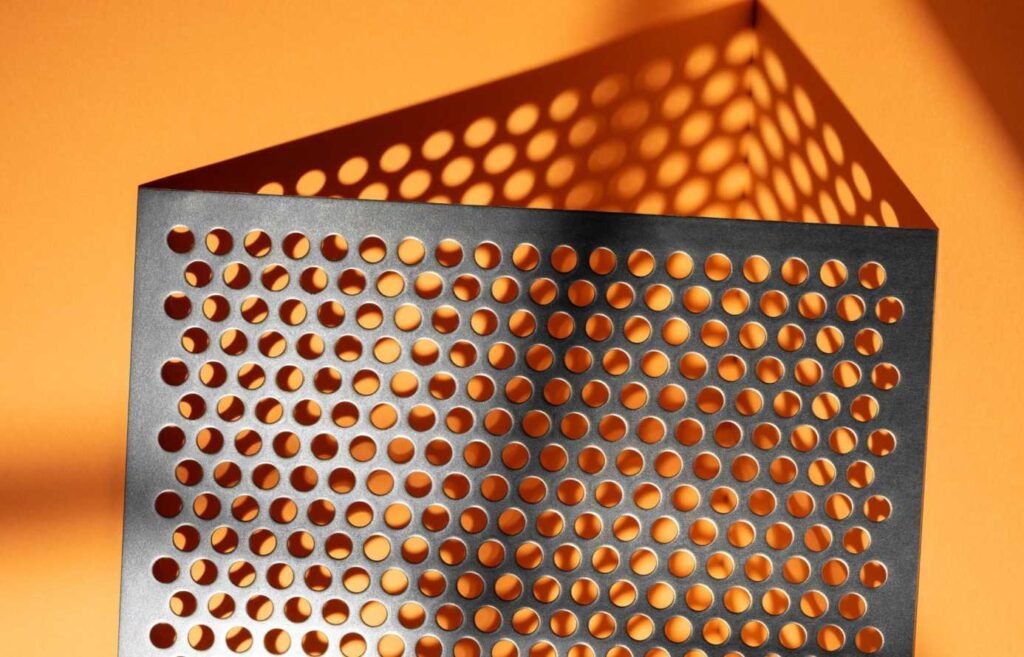 High-quality perforated sheet with 8mm round holes on 0.45mm thick mild steel sheet.