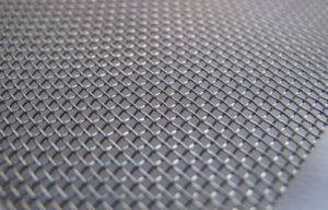 Blog - Sudharsun Traders Close-up image of 14 gauge wire mesh with evenly spaced square openings.