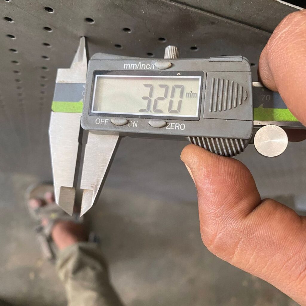Optimizing Air Pressure with Custom Perforated Metal Sheets - Sudharsun Traders Measuring thickness with digital caliper