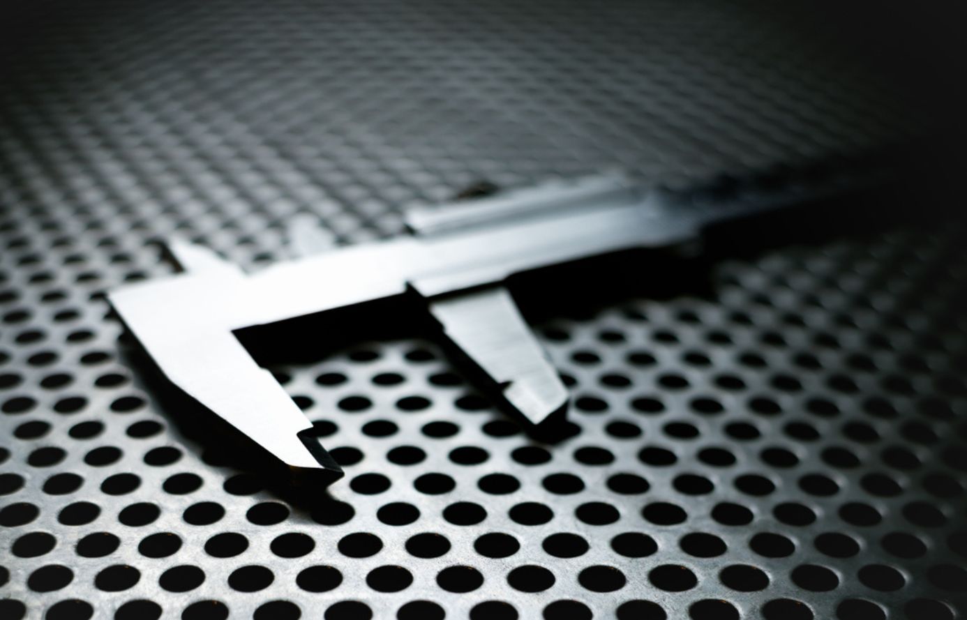 Optimizing Air Pressure with Custom Perforated Metal Sheets - Sudharsun Traders Custom perforated sheet with circular holes designed for air pressure optimization.